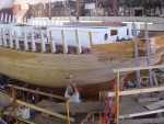 A wooden fishing boat, the Roann, in the process of being restored.