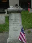 A close up of Paul Revere's head stone.