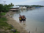 On the other side of Roatan, these boys took a 'time out' from their ball game in the water to pose for a picture.