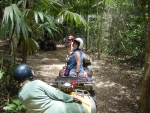 In Belize, we took an ATV tour of the jungle; here the group pauses to let the rest catch up. Heather is in Blue and our friend Heather is in front of her.