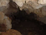 the rocks are limestone, and the stalactites on the ceiling are slow-growing.
