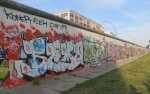 Berlin wall from the East where artists are giving ownership of individual sections. 