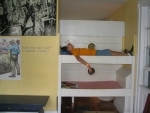 Justin trys out a sailors bunk in the children's building