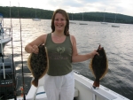 Heather with the first catch of the season for the HONEYMAYI -flounder is delicious